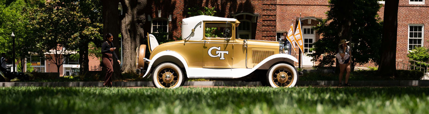 The Ramblin' Wreck, Georgia Tech's 1930 Ford Model A sport coupe, driving through Harrison Square on Tech's campus.